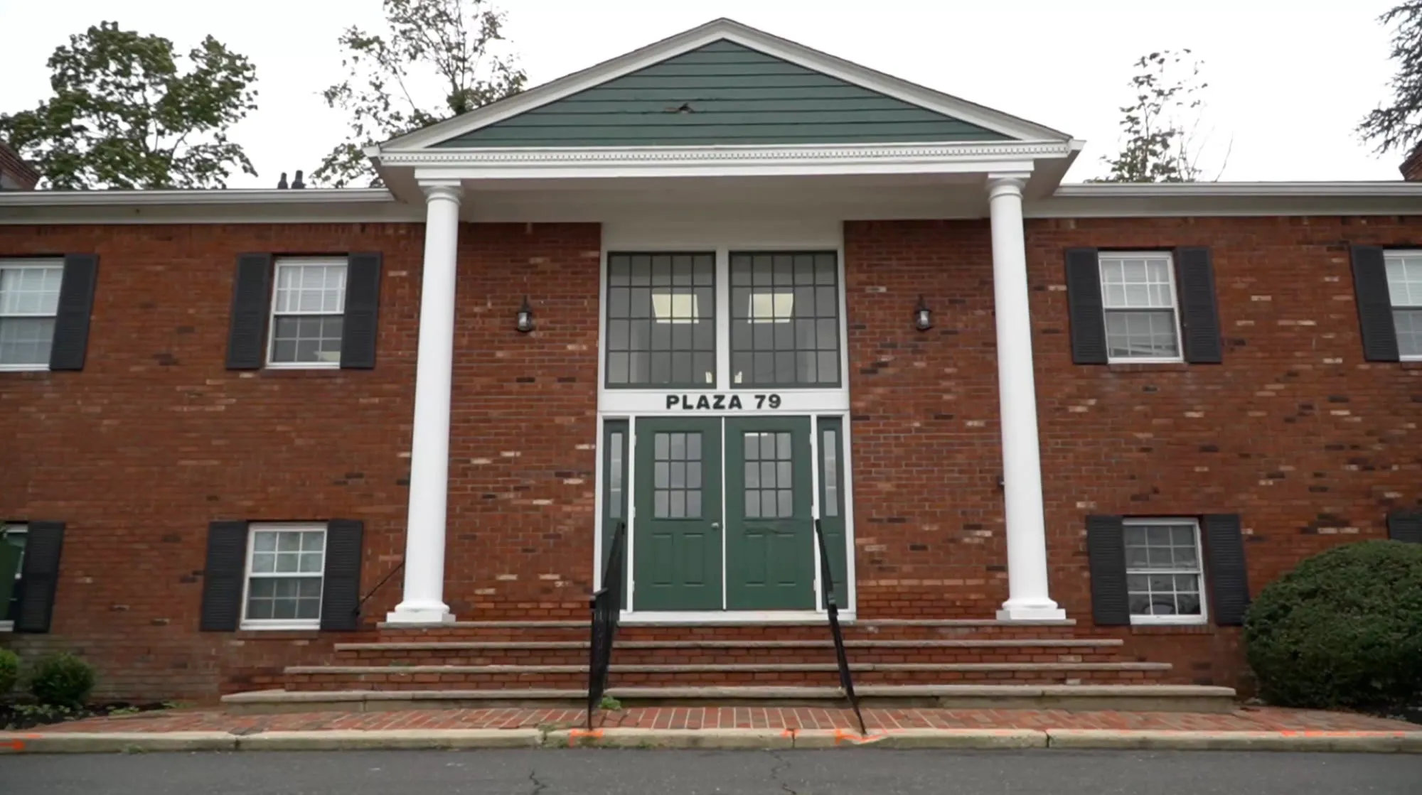 Plaza 79 — the brick office building at 2 Buck Lane, Marlboro, NJ, where JY Computer Services is located